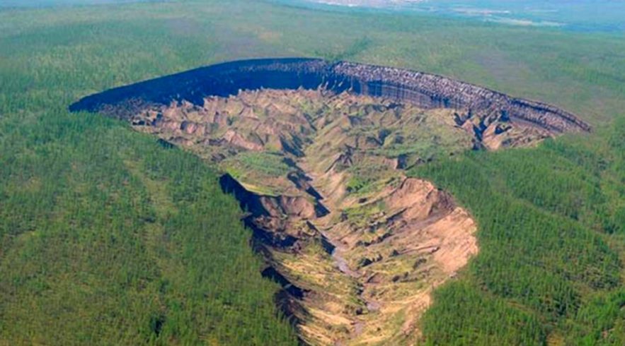 cratère trou sol fonte glace réchauffement sibérie foret sédiments