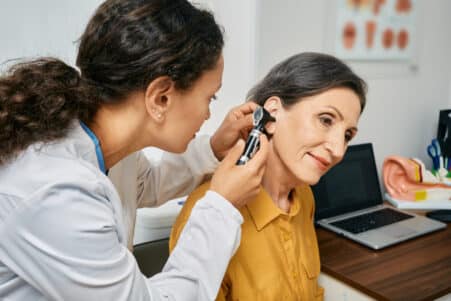 quand consulter un audioprothesiste pour des problemes audition couv